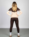 A view of the back of our brown equestrian leggings with full non slip seat.